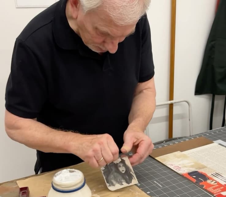 An Artist working with a photo